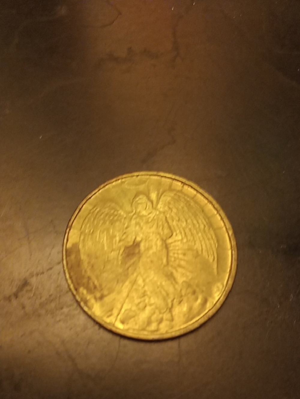 Gold-Tone Winged Figure Coin Pendant